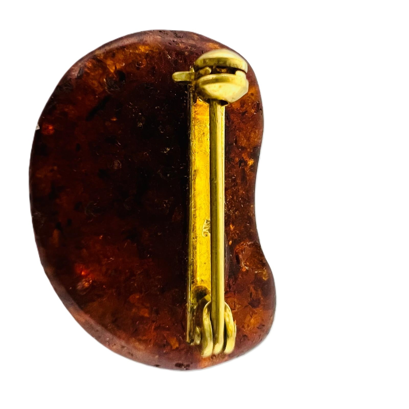 Antike Bernsteinbrosche Cognac