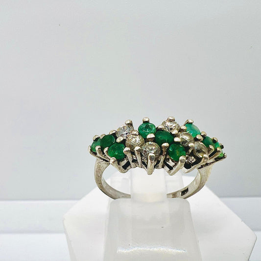 Art Deco unique silver ring with emerald gemstones and white zircons