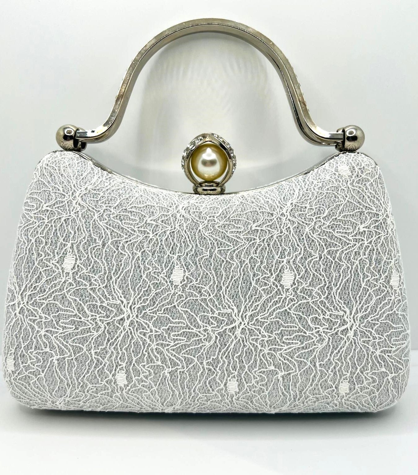 Clutch aus Spitze in Weiß und Silber
